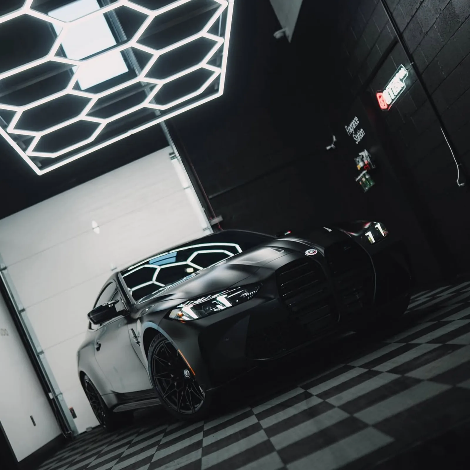 Dark BMW after paint correction and ceramic coating